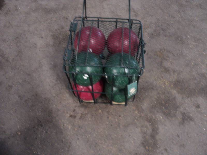 lot 2 image: Bocce Ball Game in wire basket...