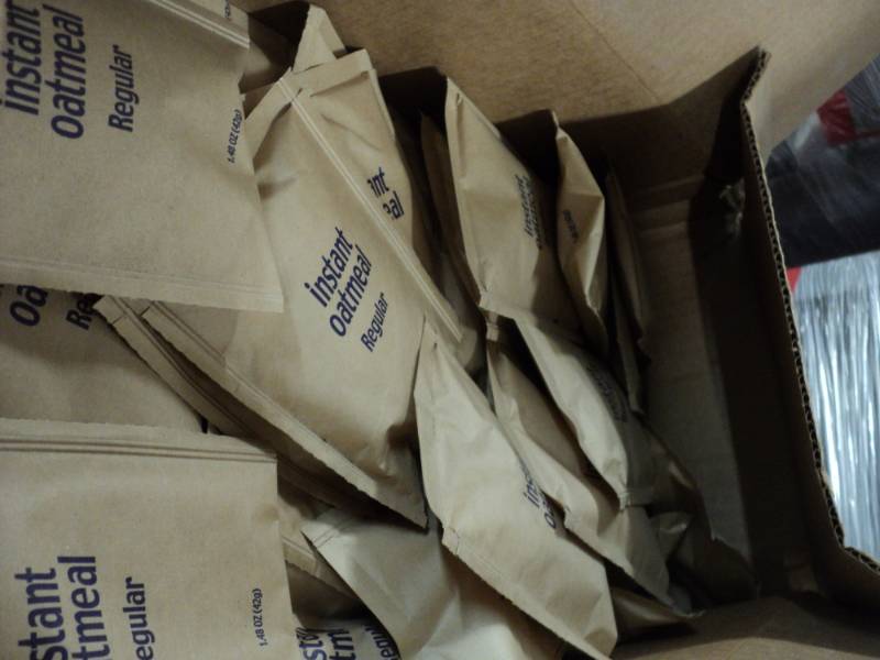 lot 144 image: Case of 250 Packets of Village Farm...