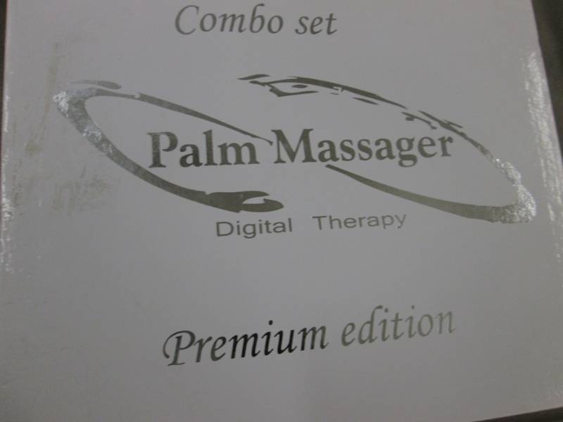 lot 140 image: Palm Massager Digital Therapy...