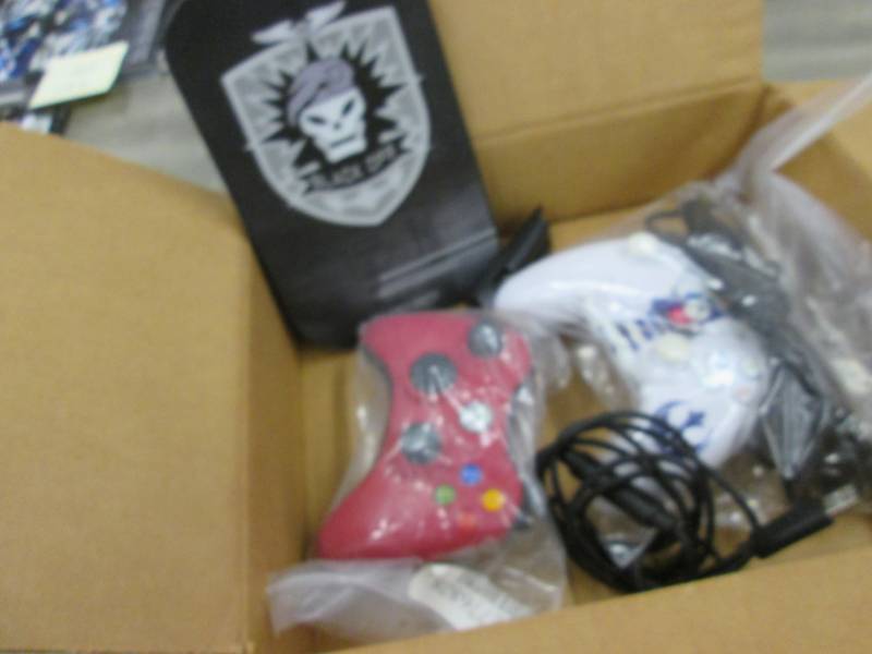 lot 198 image: Controllers plus Black Ops Item...