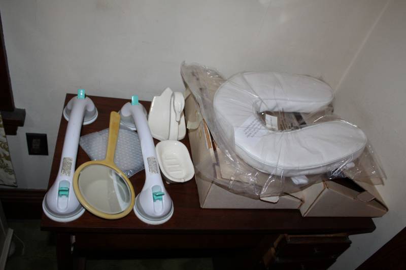 lot 40 image: Bathroom Safety Bars, Seat Cushion and Mirrors