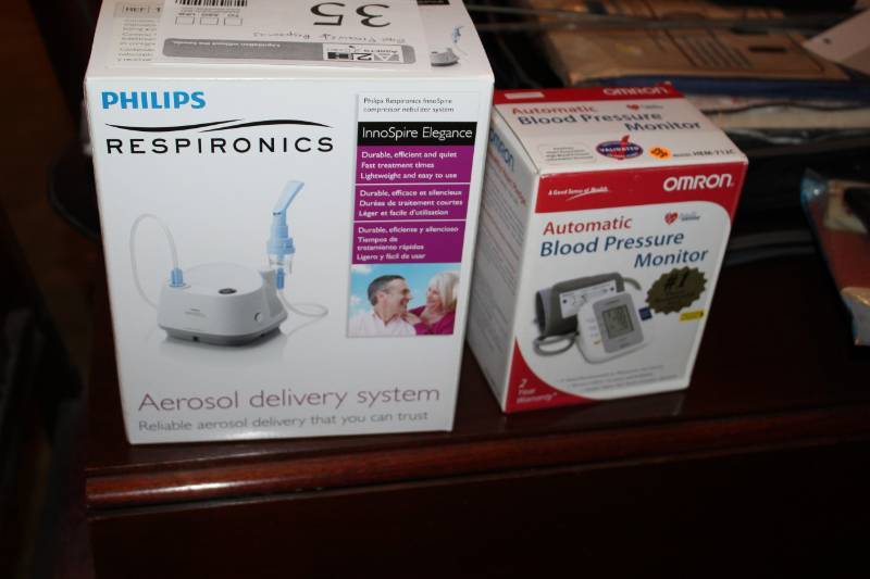 lot 35 image: Omron Automatic Blood Pressure Monitor and Philips Respironics