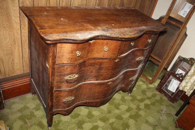 lot 4 image: Rolling Wood Dresser with 4-Drawers