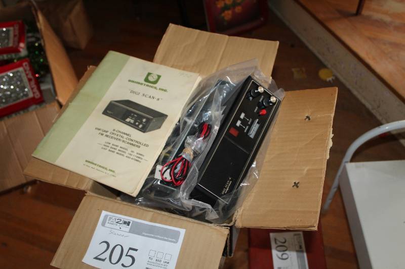 lot 205 image: Unimetrics, Inc. Digi Scan 8-channel VHFUHF Crystal Controlled FM ReceiverScanners with Manual