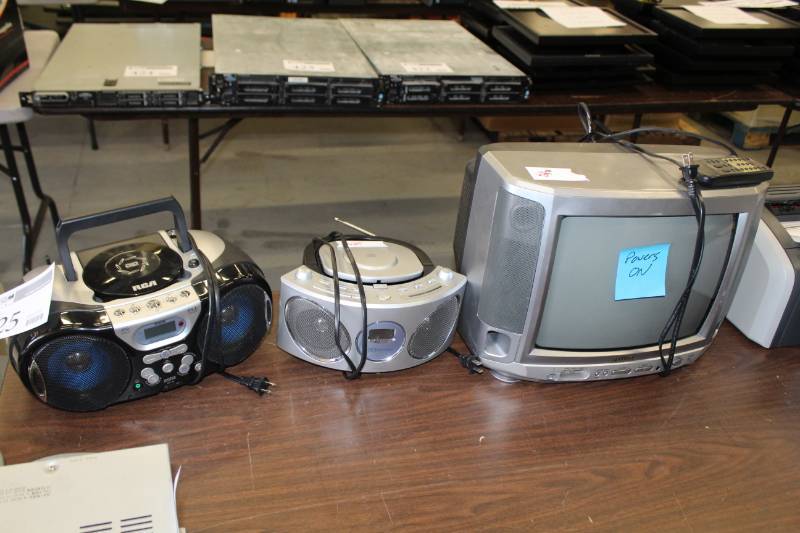 lot 425 image: RCA Portable AMFMCD Player, Emerson Bass Extender, Aiwa Monitor