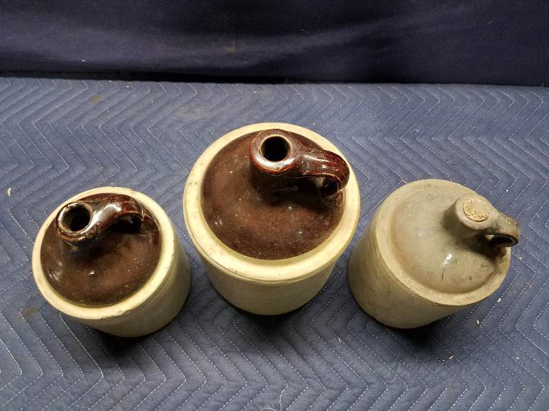 lot 63 image: Crock Jugs