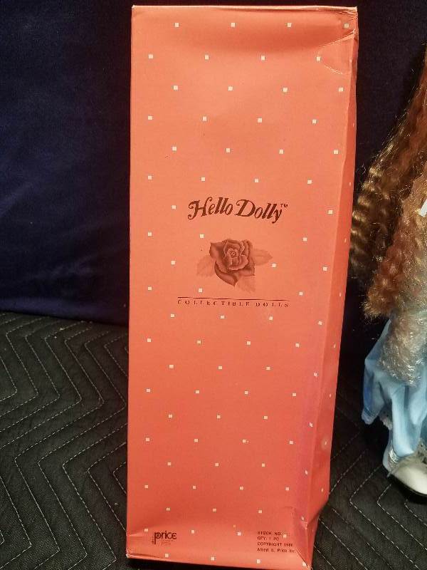 lot 115 image: Collectible Doll