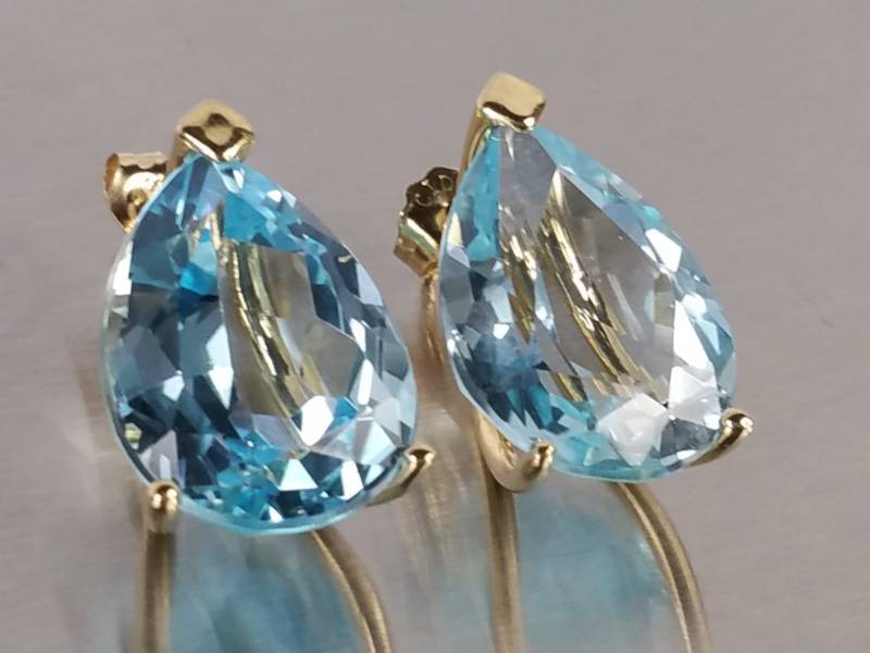 Ladies Extra Fine Blue Topaz Earrings in 14k Gold