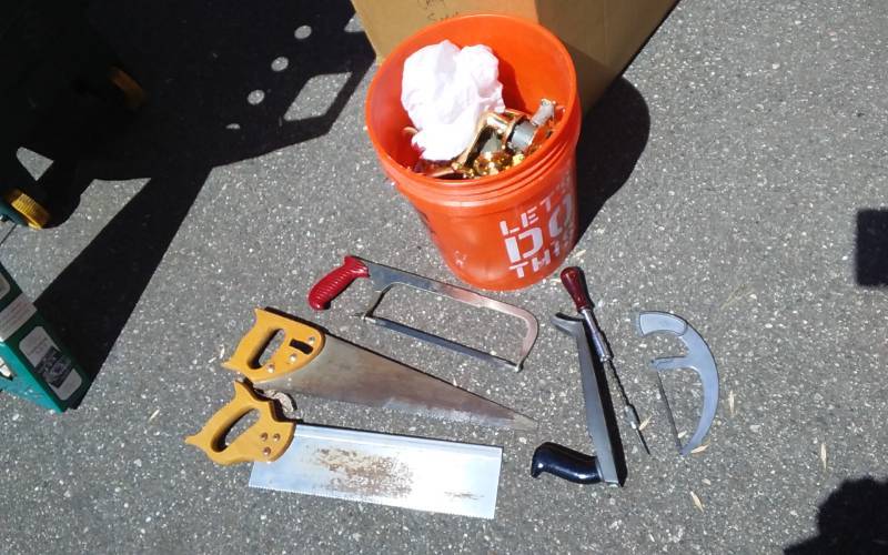 lot 15 image: Pail & Assorted Hand Tools Saws, Files, Brass Door Knobs & Hinges