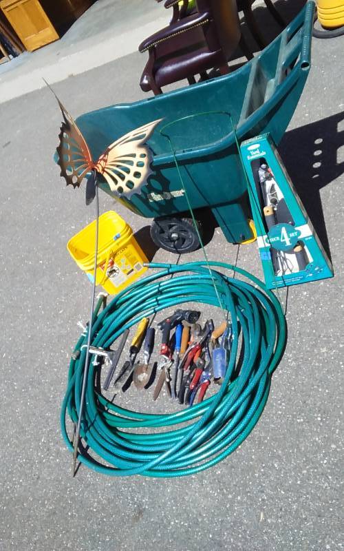 lot 18 image: Ames Easy Roller Garden Cart, 2-Hoses, Garden Hand Tools & New Set With Loppers, Monarch Butterfly Metal Garden Art