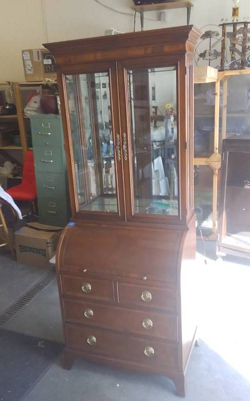 lot 42 image: Lighted Roll Top Secretary Writing Desk With 4 Drawers, 2-Door Top Hutch 30x18x78T. 2-Adjustable Glass Shelves. (2 Pieces. Easy Handling)