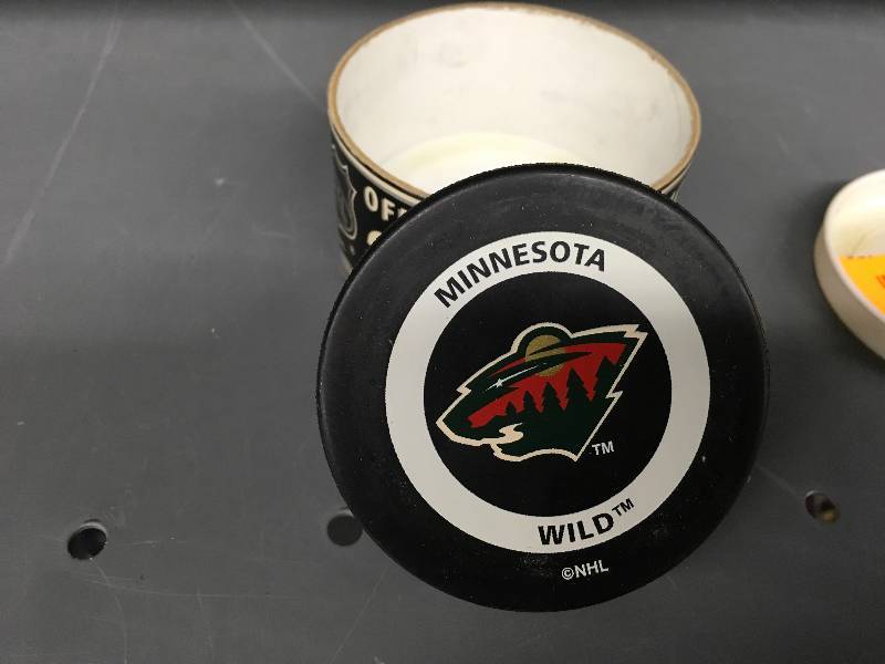 lot 447 image: Minnesota Wild Official Game Puck