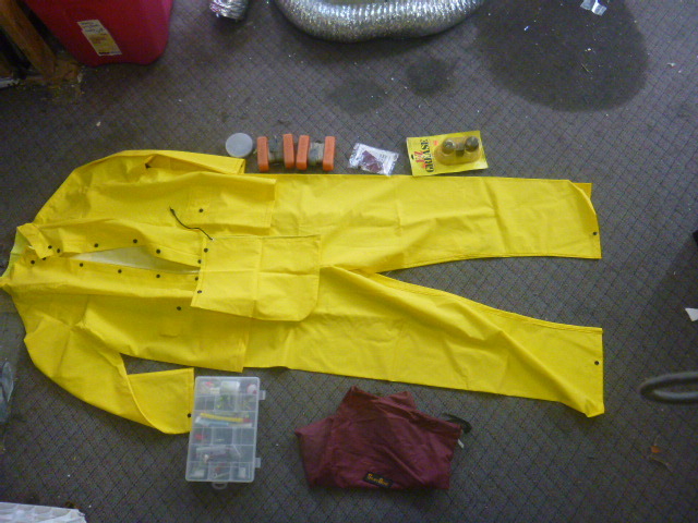 lot 66 image: Yellow Polly Suit and Fishing Items