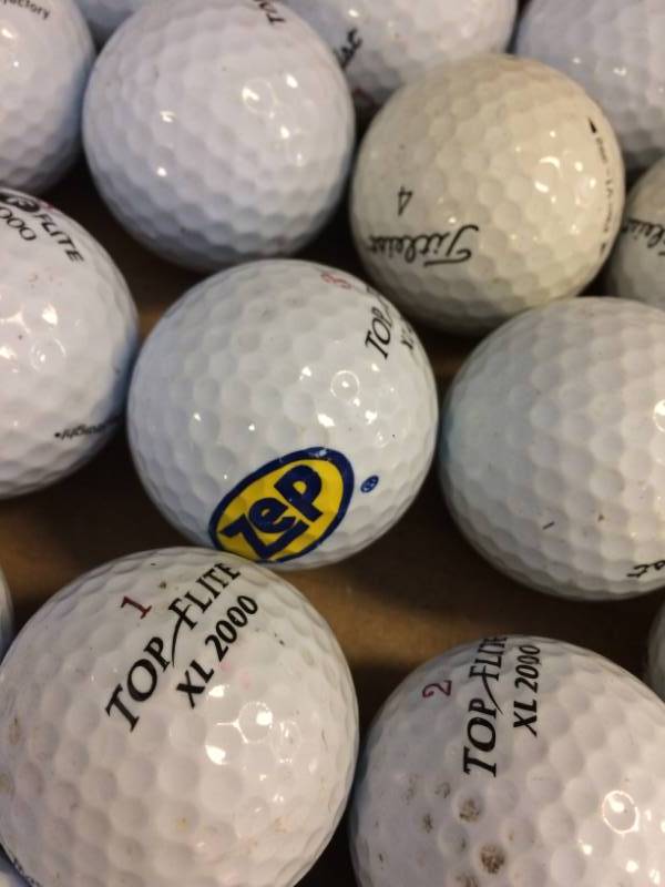 lot 33 image: Golf Balls, Top Flight and Titleist