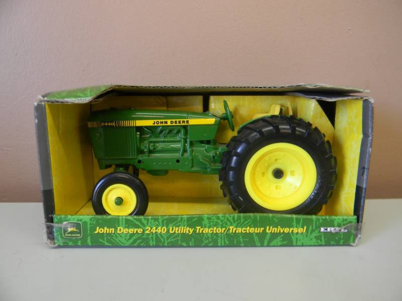 lot 12 image: ERTL JOHN DEERE 2440 UTILITY TRACTOR - NEW IN BOX - SEE PICTURES