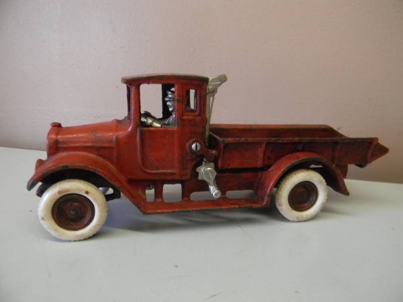 lot 29 image: WOW - AWESOME RARE RARE RARE - EARLY 1900s - Arcade Red Baby International Harvester Cast Iron Truck Stamped Arcade - THE REAL DEAL - GREAT PIECE SELLING FOR UP TO $700.00 - SEE PICTURES