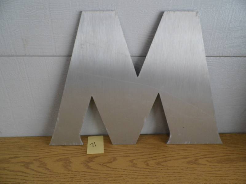 lot 71 image: Aluminum Letter M