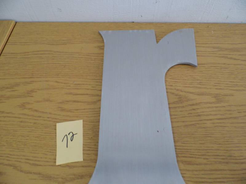 lot 72 image: Aluminum Letter r