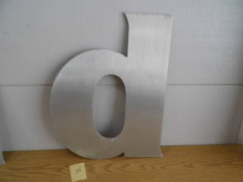 lot 75 image: Aluminum Letter d