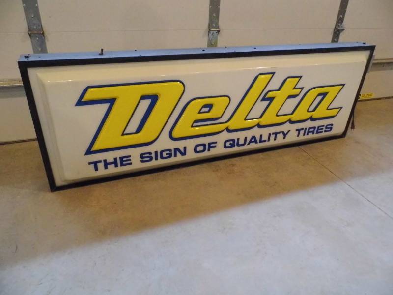 lot 108 image: Delta Double Sided Tire Sign