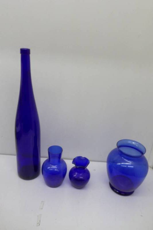 lot 76 image: Blue Glass Vases and Bottle