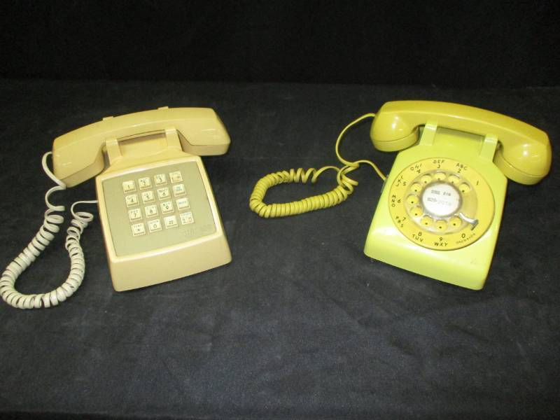 lot 19 image: Two Old Vintage Telephones Yellow and Beige