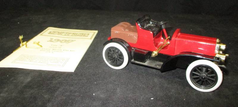lot 27 image: Deere-Clark Motor Car Company Red Car with Box