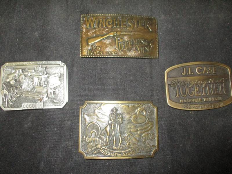 lot 36 image: Four Buckles J.I Case, Winchester, Case I.H. Amoco