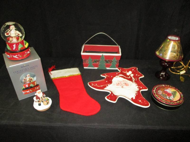 lot 132 image: Hallmark coca cola snow globe, twas the night before xmas lamp, christmas santa serving tray and santa candle topper and more