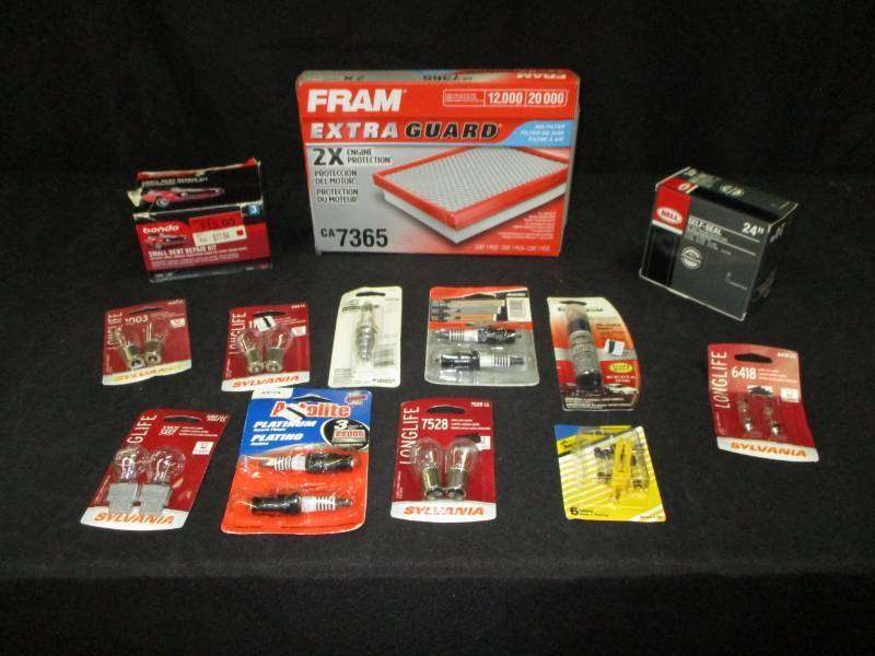 lot 140 image: Automotive bulbs, fuses, air filter and body repair items