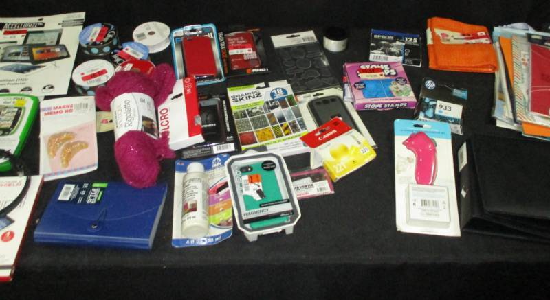 lot 146 image: New in package Craft fabric and ribbon, book cover, variety of phone cases and screen protectors, Printer ink cartidges, Velcro, Tablet Cases and screen protectors