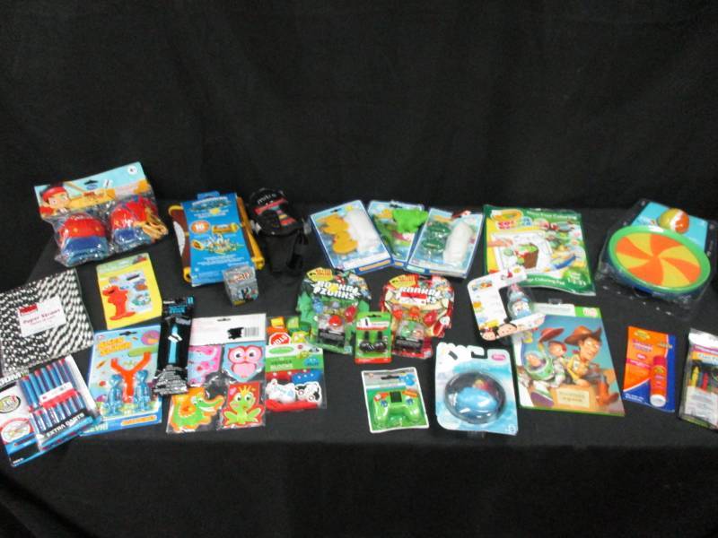 lot 151 image: New Toys, Games, Knee pads, Books, sunscreen, Bath toys