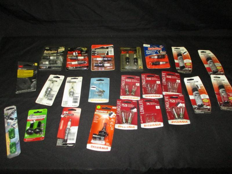 lot 156 image: New automotive, Spark plugs, Light bulbs, and Touch up paint