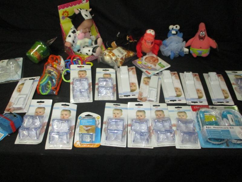 lot 160 image: Baby safety stuff, baby toys and stuffed animals, sippy cup and a book and more