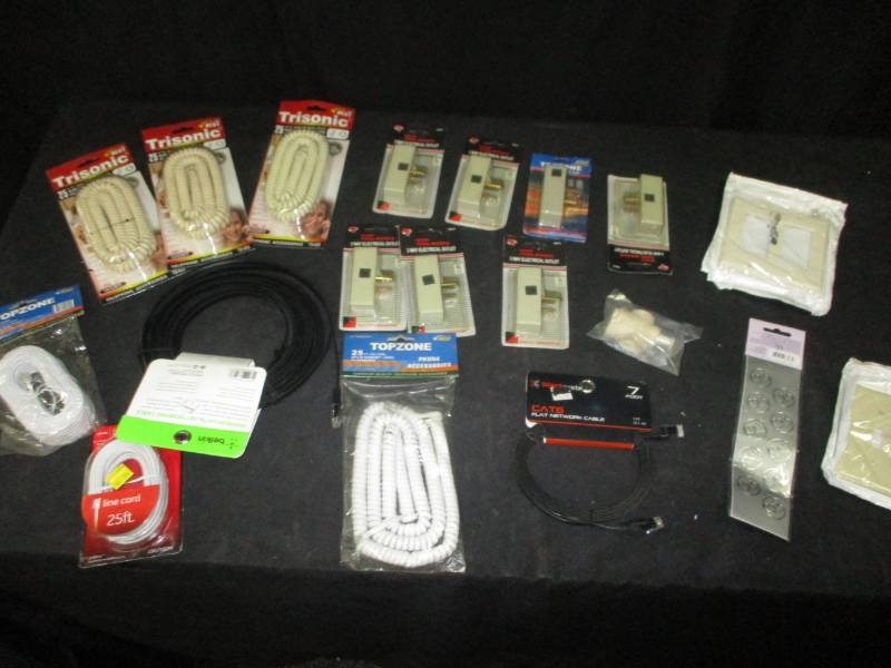 lot 164 image: Phone Cord, Ethernet cable, Switch covers, and Multi plug wall adapters