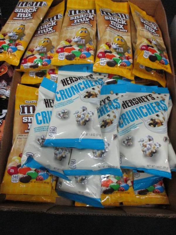 lot 181 image: 36 Packs of M&m and Herseys Snacks