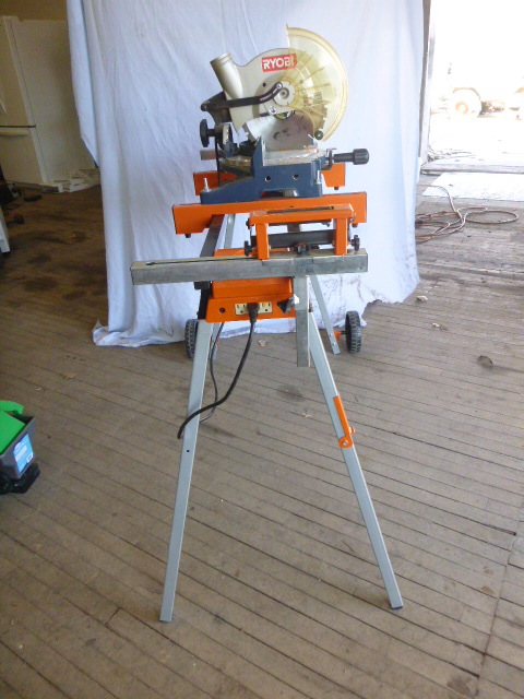 lot 31 image: Ryobi Miter Saw on Stand
