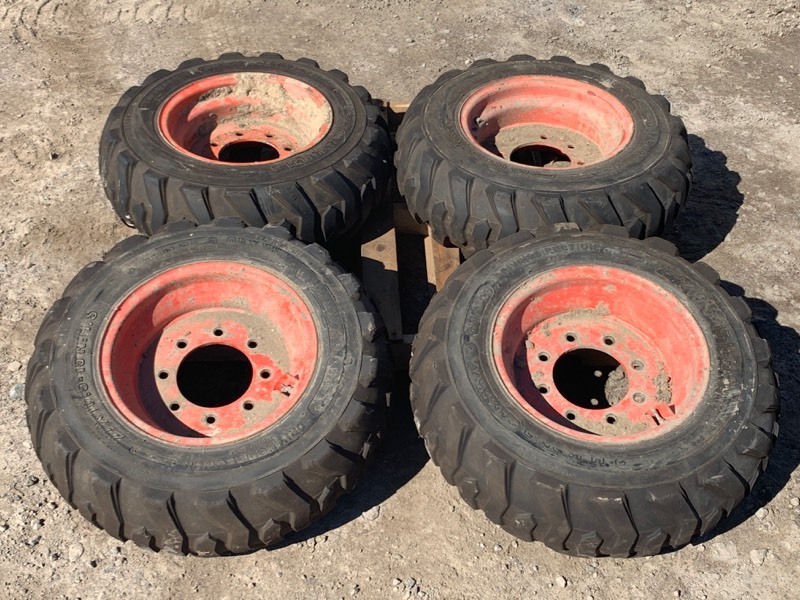 lot 6 image: (4) Skid-Loader Wheels & Tires
