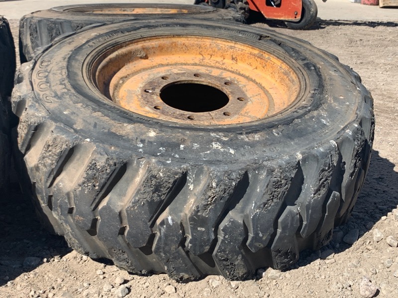 lot 5 image: (4) Skid-Loader Wheels & Tires
