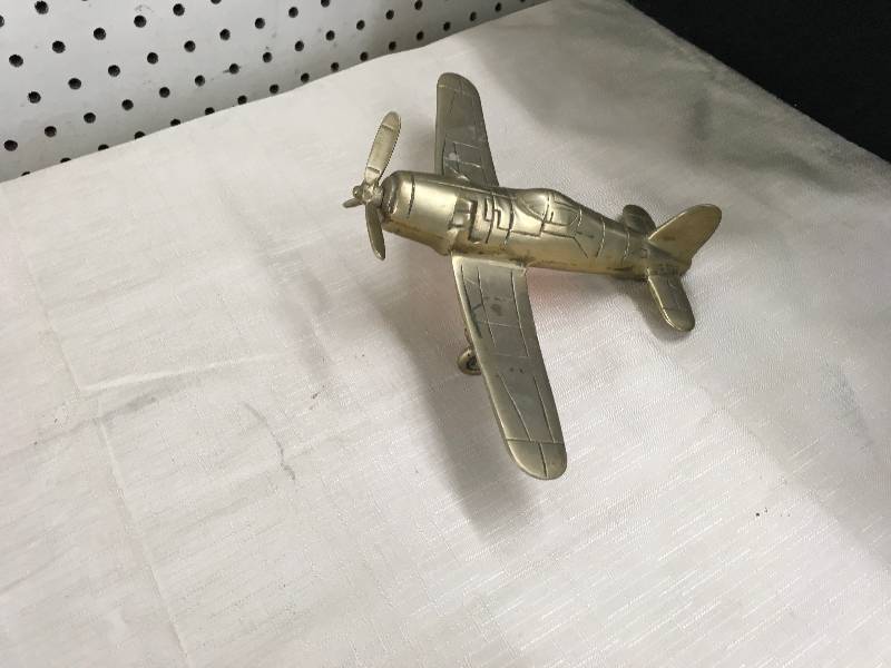 lot 551 image: Brass Airplane