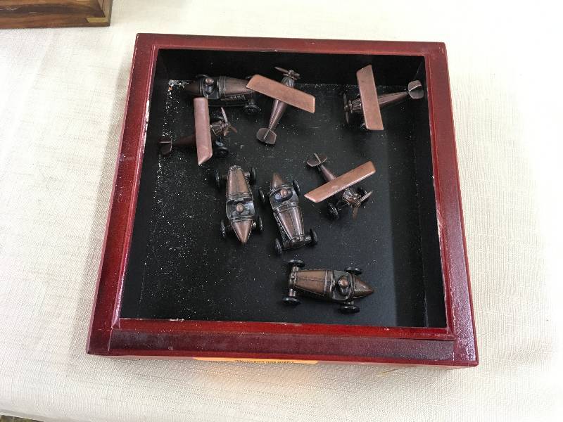 lot 552 image: Brass Airplanes & Cars