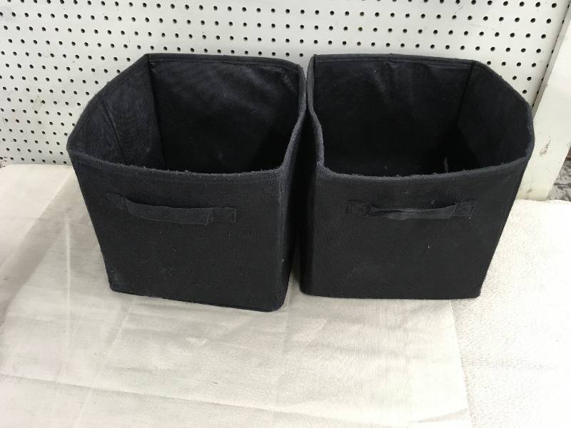 lot 557 image: Two Storage Bins