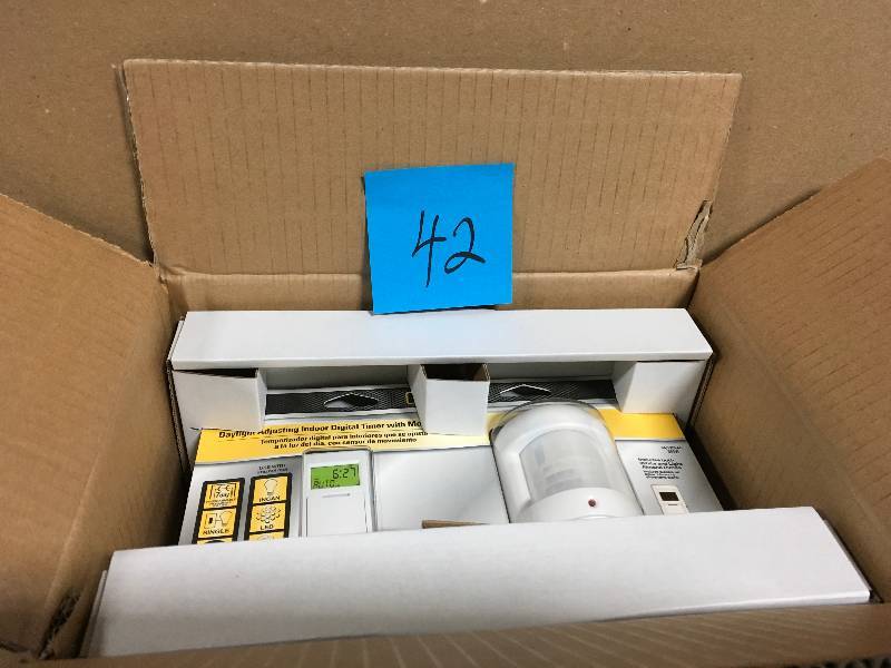 lot 42 image: Defiant 8 Amp 7-Day Indoor In-Wall SunSmart Digital Timer Switch with Motion Sensor, White BOX 3 PACK  in good condition