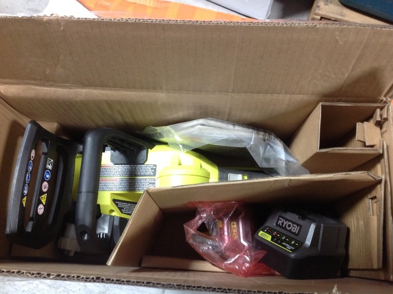 lot 105 image: RYOBI ONE 12 in. 18-Volt Brushless Lithium-Ion Electric Cordless Chainsaw - 4.0 Ah Battery and Charger Included in working conditions