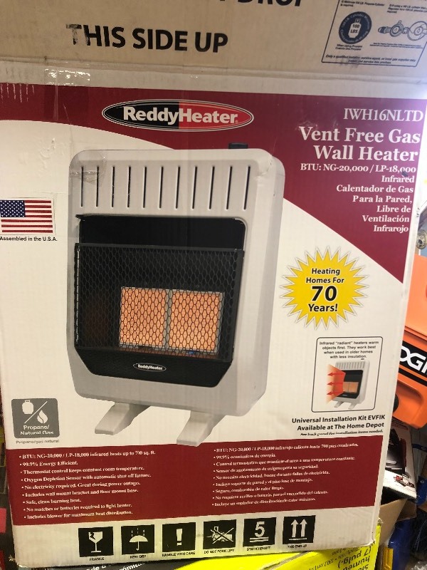 lot 116 image: Reddy Heater 18,000 - 20,000 BTU Infrared Dual-Fuel Wall Heater with Blower in working conditions no legs or bracket support
