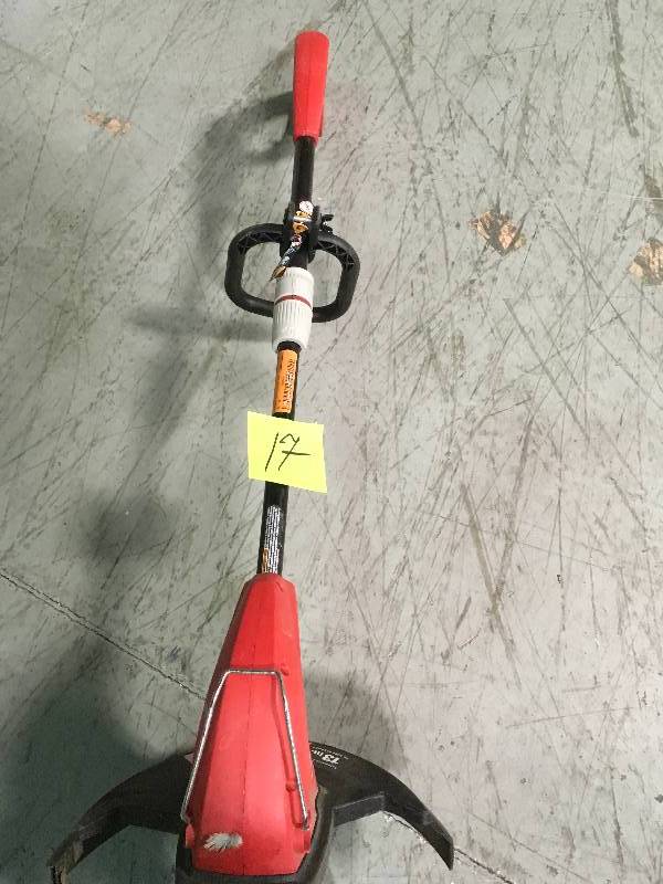 lot 17 image: Homelite 13 in. 4 Amp Straight Electric String Trimmer in good condition