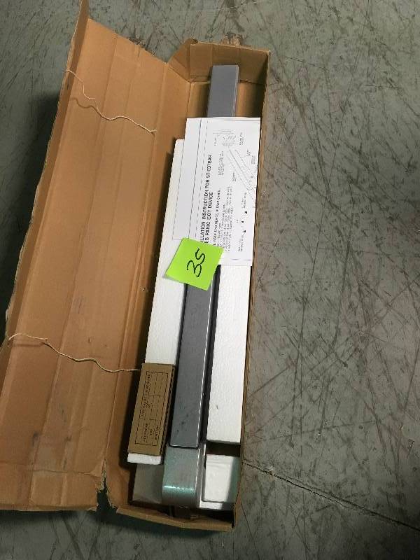 lot 35 image: Global Door Controls 32 in. Aluminum Touch Bar Exit Device in good condition