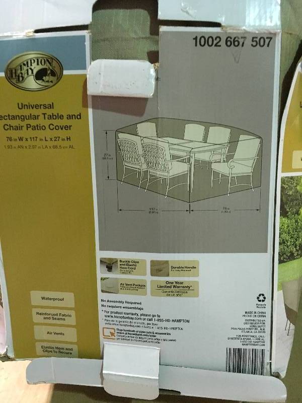 lot 4 image: Hampton Bay Patio Rectangular Table with Chair Cover  in good condition