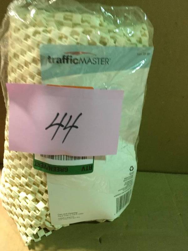 lot 44 image: TrafficMASTER Premium 2 ft. x 8 ft. Rug Gripper Pad not used