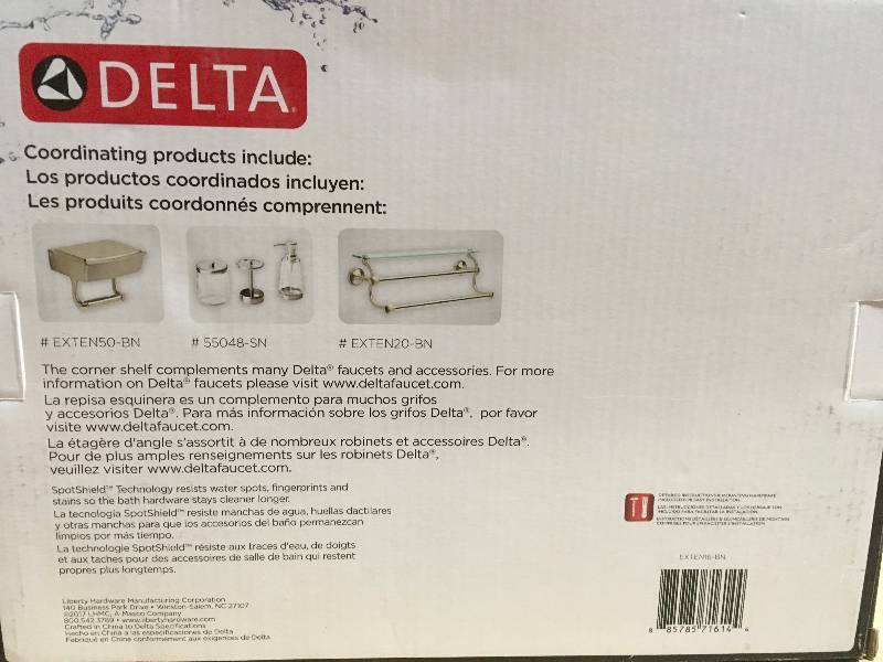 lot 67 image: Delta 8 in. W Glass Corner Shelf in Brushed Nickel in good condition